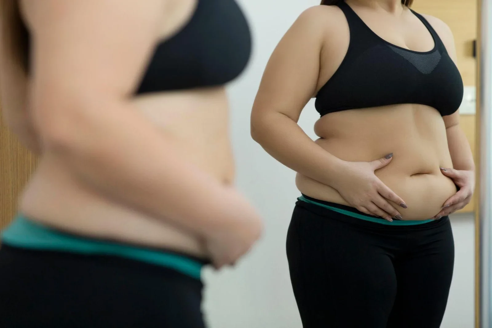 Do fat burners work for females? Woman with fat abdomen